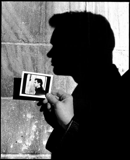 Jim Carrey (holding polorid B&W), Los Angeles CA, 1998 - Morrison Hotel Gallery